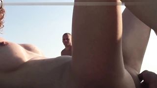 Couple have sex on nudist beach