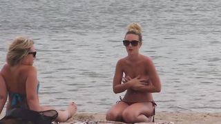Small boobs on the beach